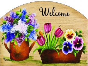 The Backyard Naturalist has outdoor garden plaques back in stock! After slate became impossible to source, the artists now put their designs on durable aluminum, protected with a UV-resistant clear coat. Designs vary, but this welcomes you with a beautiful Spring floral arrangement, including tulips and pansies.