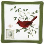 The Backyard Naturalist has Alice's Cottage textiles that include tea towels, spiced mug mats, potholder, totes and more. This design shows a male Cardinal on a branch with an egg.