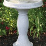 The Backyard Naturalist has concrete bird baths and fountains, like this Massarelli design that's hand made and painted here in the USA. Pictured here is Rachel Bath.