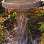 The Backyard Naturalist has concrete bird baths and fountains, like this Massarelli design that's hand made and painted here in the USA. Pictured here is Tree Stump Bath.