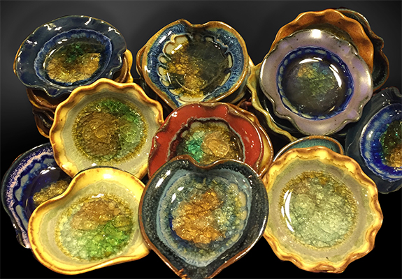 The Backyard Naturalist little pottery dishes Handmade in the USA all natural materials and recycled glass.