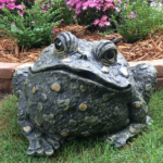 The Backyard Naturalist has Toad Hollow's garden statuary Toads, with whimsical glass eyes!