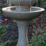 The Backyard Naturalist has concrete bird baths by Massarelli, like 'Tranquility Spill Fountain'.